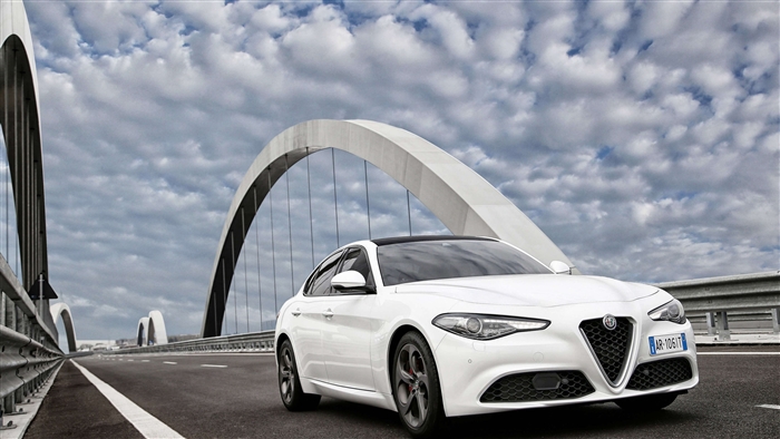 White Alfa Romeo Giulia 2016 4K on a bridge