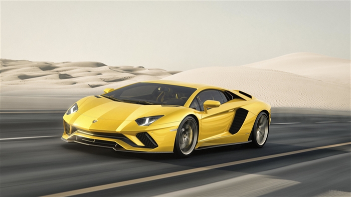 Yellow Lamborghini Aventador S driving on a desert road