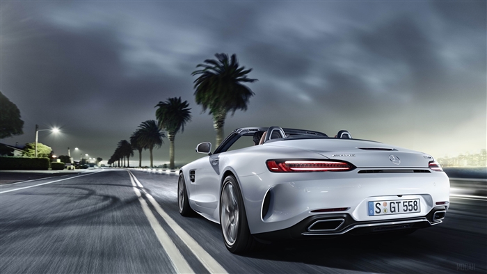 Mercedes-AMG GT C Roadster driving at night