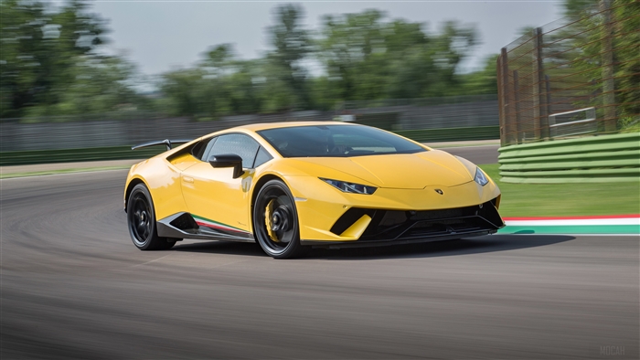 Yellow 2018 Lamborghini Huracan Performante on track