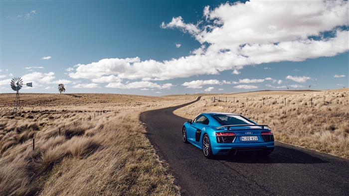 Blue Audi R8 V10 on Winding Country Road