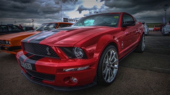 Red Ford Mustang Shelby GT500 with Black Stripes