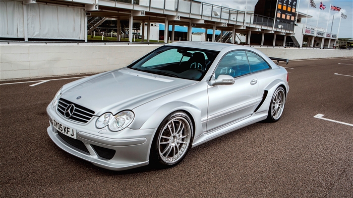 Silver Mercedes-Benz CLK-Class AMG on a Racetrack