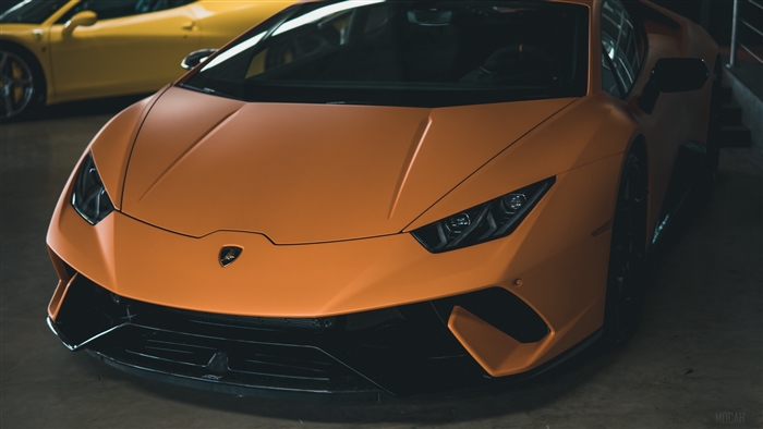 Orange Lamborghini sports car front view 4K