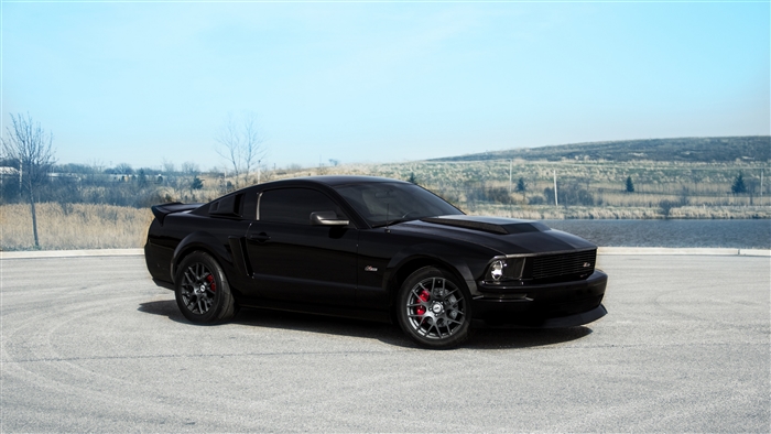 Black Ford Mustang GT with red brake calipers