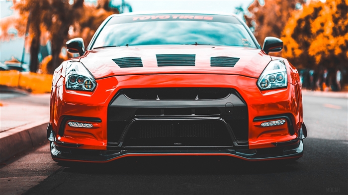 Red Nissan GT-R with TOYO TIRES banner