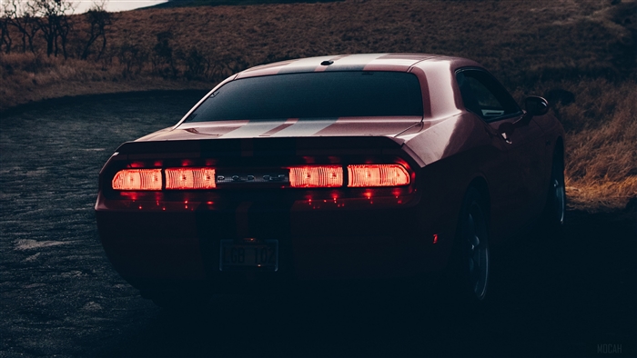 Red Dodge Challenger with racing stripes, rear view, evening 4K