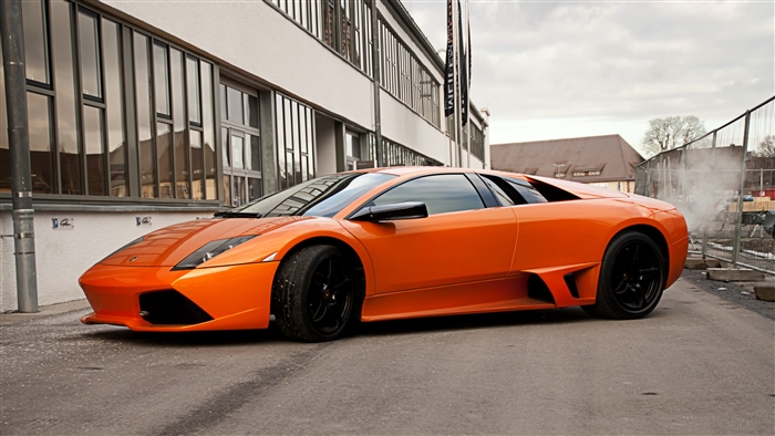 Orange Lamborghini Murcielago LP640 with black wheels