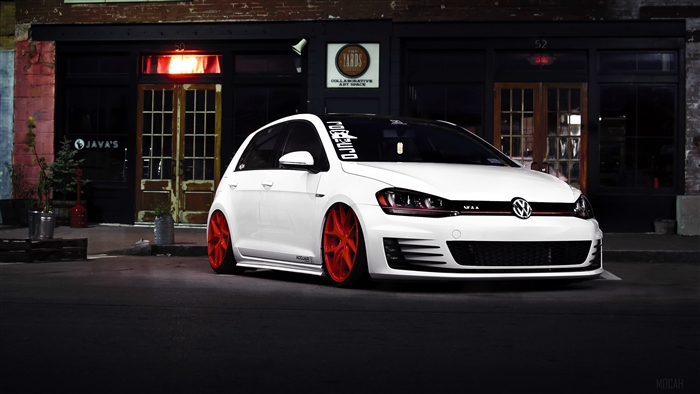White Volkswagen Golf GTI with Red Rims in Front View 4K