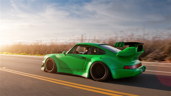 Green Porsche 911 RWB on a road