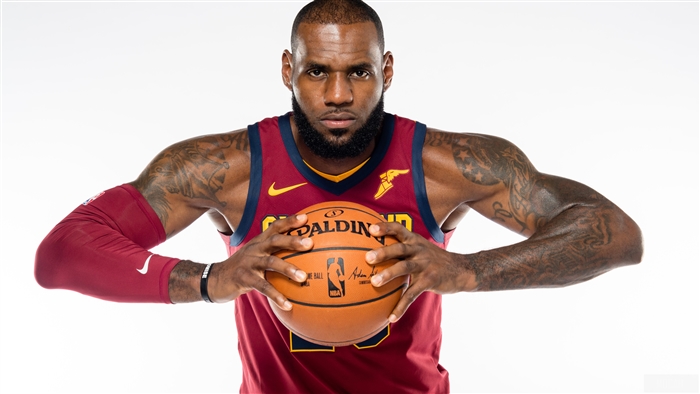 LeBron James holding a Spalding basketball