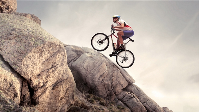 Mountain biker on a rocky slope