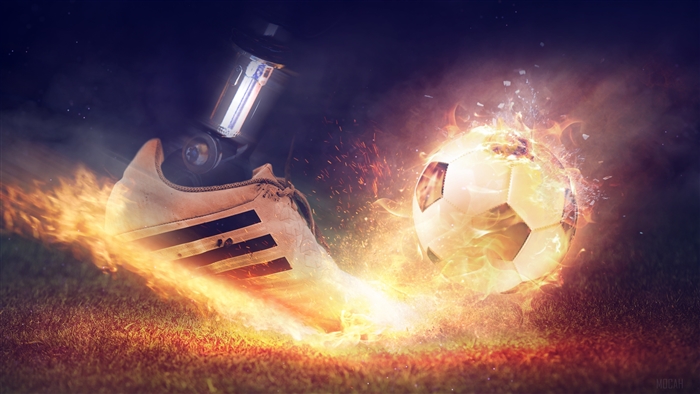 Football shoe and ball on fire