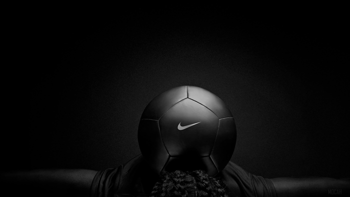 Nike football on a person's head