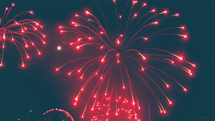 Red fireworks in the night sky
