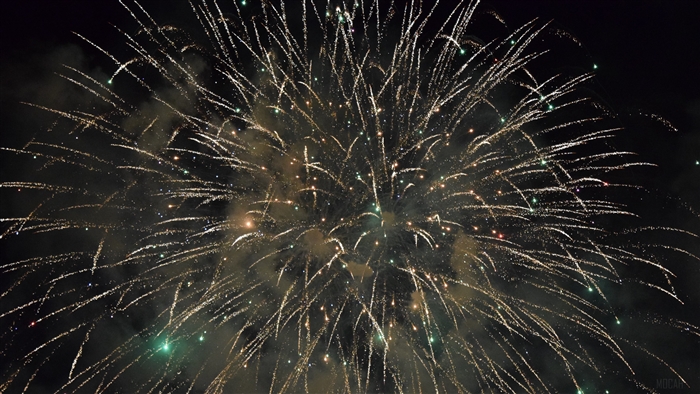Fireworks display with sparks and smoke
