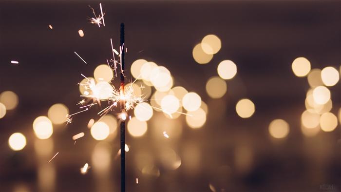 Sparkler with bokeh lights 4K