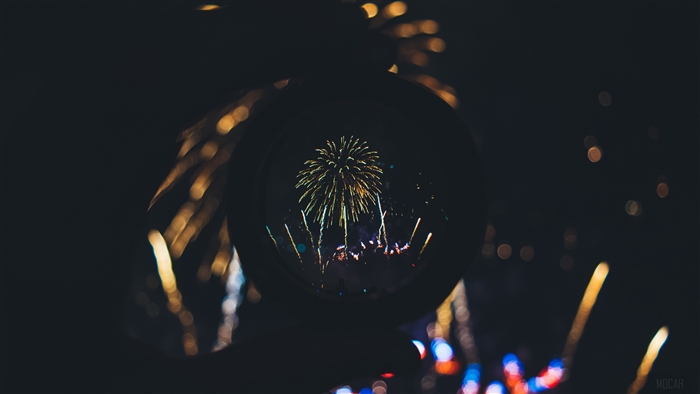 Fireworks viewed through a lens