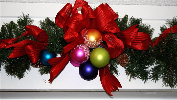 Christmas garland with red ribbon and ornaments 4K