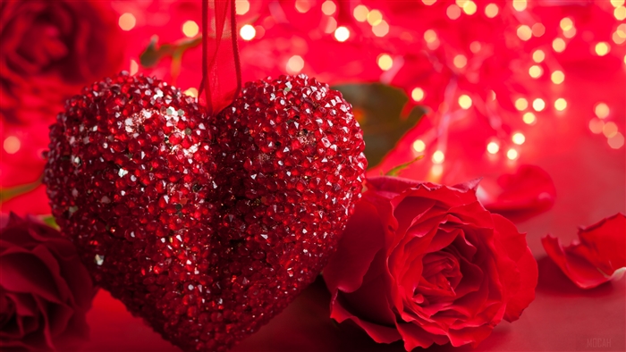 Red heart decoration with roses and bokeh lights