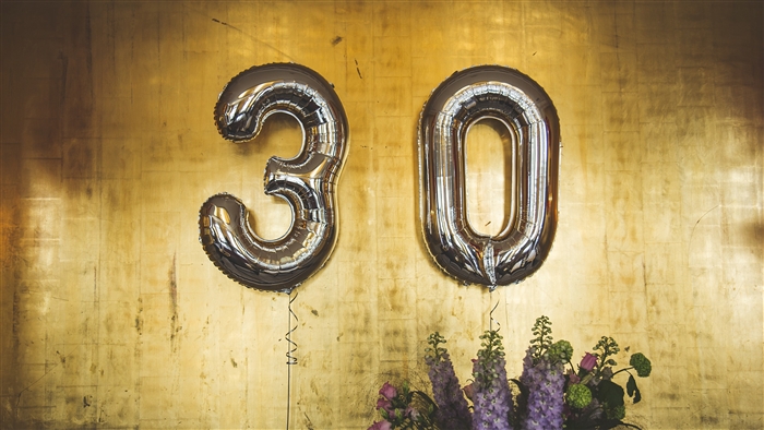 Number 30 Balloons on Gold Wall
