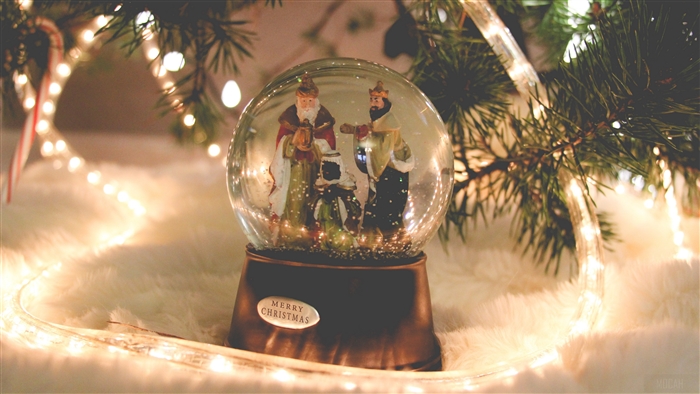 Christmas snow globe with nativity scene and lights