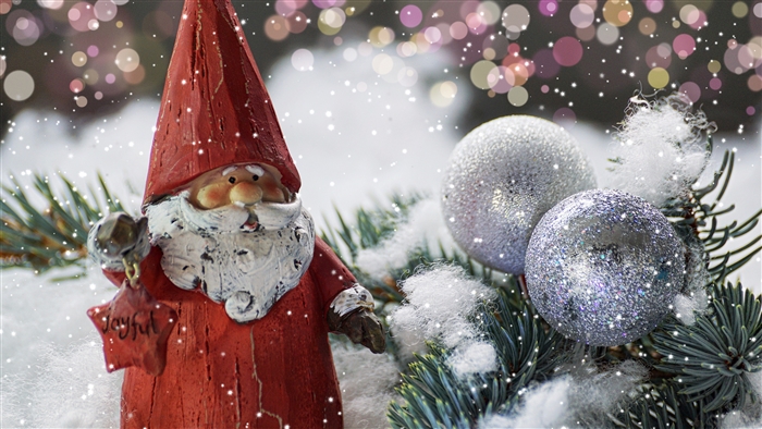 Santa Claus figurine with Christmas ornaments