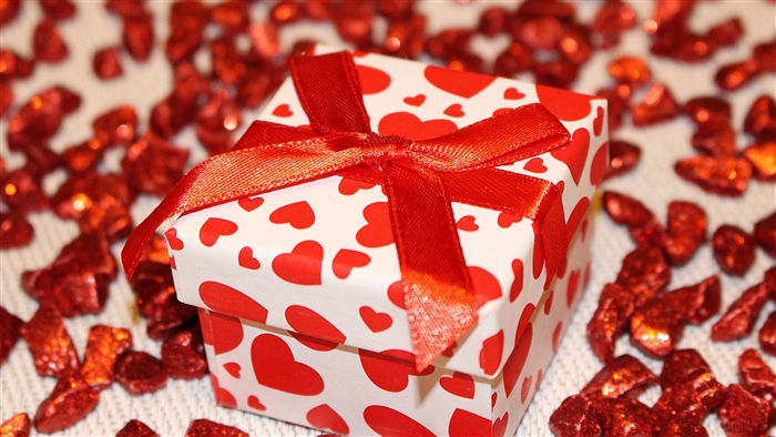 Gift box with red hearts and ribbon, 4K