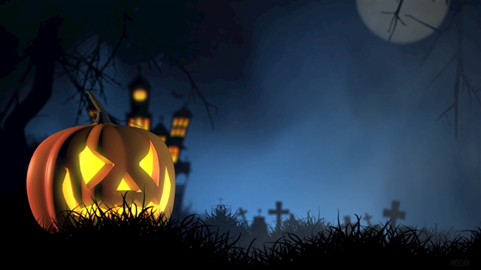 Halloween pumpkin in a spooky graveyard with a haunted house