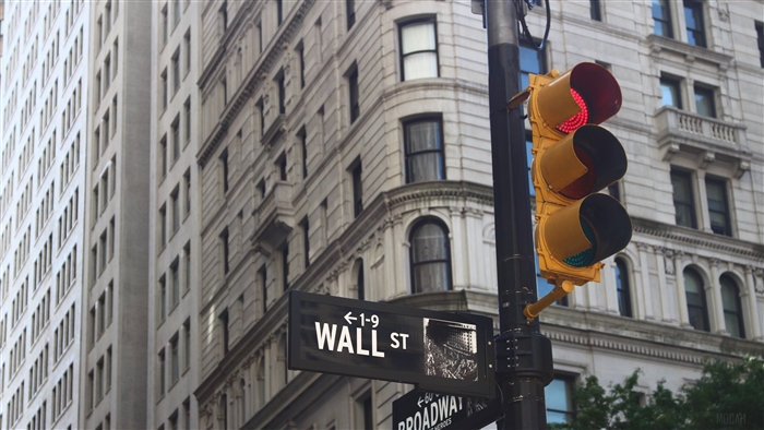 Wall Street sign and traffic light