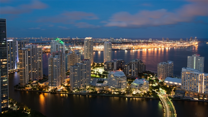 Miami skyline at night with city lights and skyscrapers