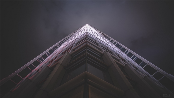 Skyscraper facade from below at night 4K