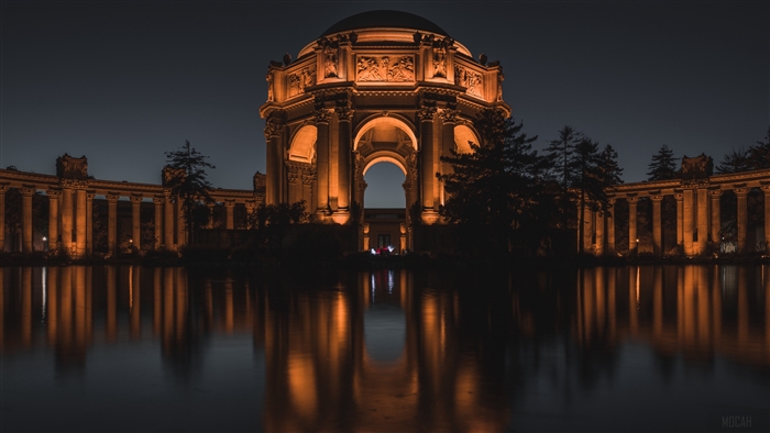 Palace of Fine Arts at night with reflections