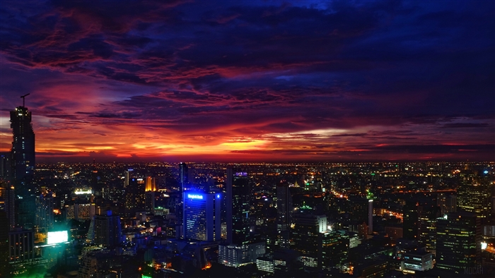 Bangkok cityscape at sunset with dramatic clouds