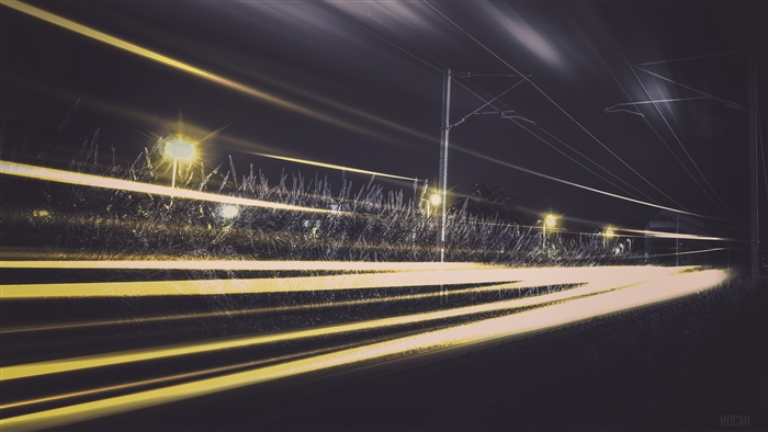 Light trails on a railway at night