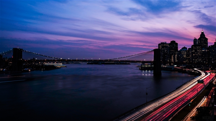 Brooklyn Bridge at Night with City Skyline and Light Trails 4K