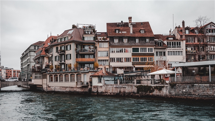 Buildings along a river in Thun, Switzerland 4K