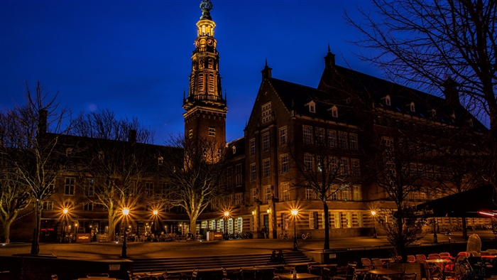 Building and tower at night in Holland 4K