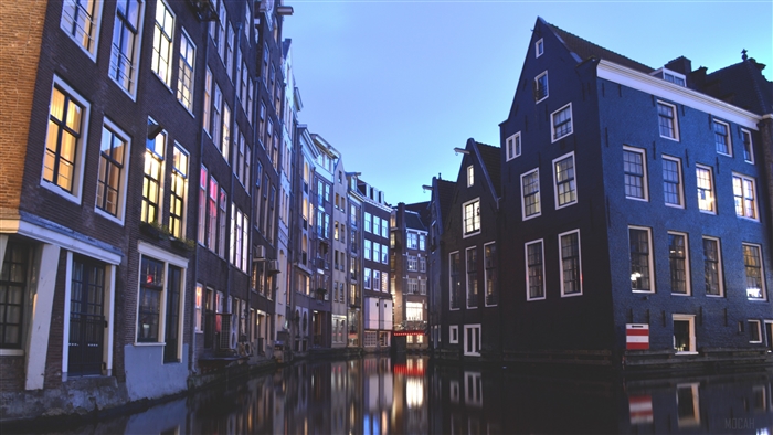 Amsterdam canal buildings at dusk 4K