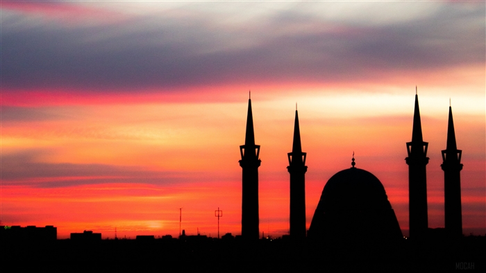 Mosque silhouette at sunset with colorful sky 4K
