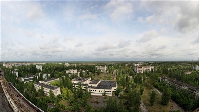 Abandoned apartments and trees in a ghost town 4K