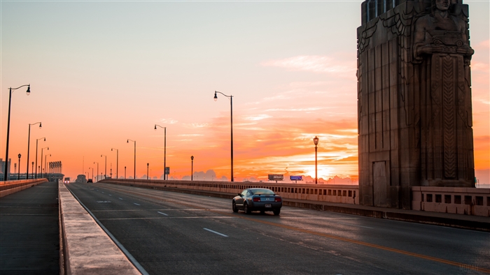 Car on Cleveland Bridge at Sunset 4K