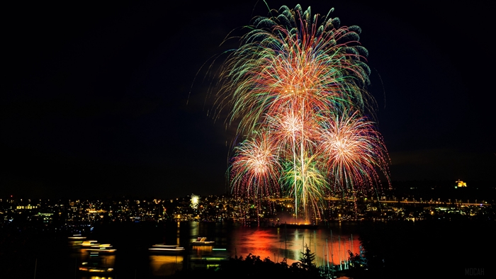 Fireworks over a city at night