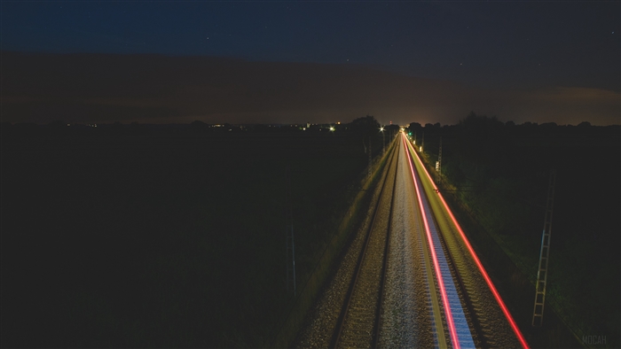 Railway at night with light trails 4K