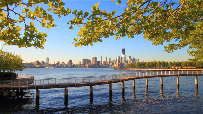 New York City skyline and Hudson River with pier