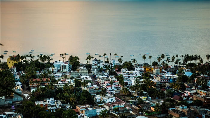 Coastal town with buildings and boats in Mexico 4K