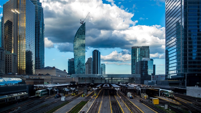 Skyscrapers and railway station with trains
