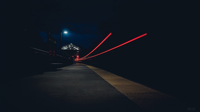 Train light trails at night station 4K