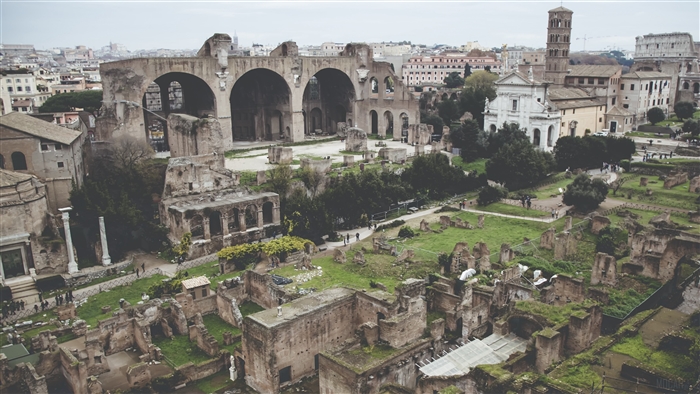 Ancient Roman ruins with Colosseum in the background, 4K