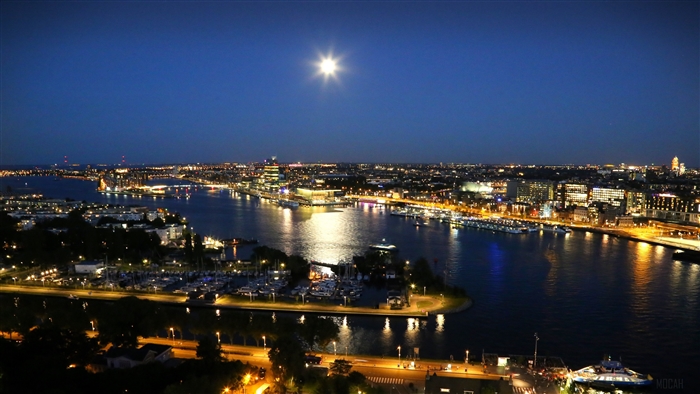 Amsterdam at night with moon, Netherlands 4K